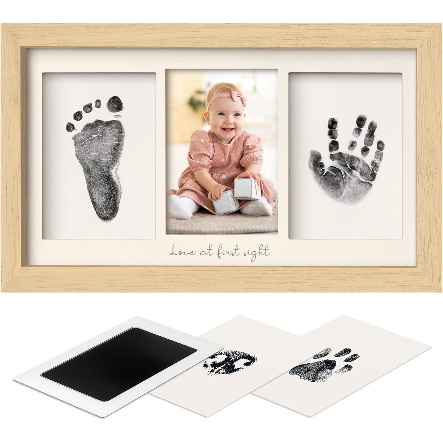 DIY hollow photo frame with baby's 100-day and first birthday hand and footprints, pet paw prints, and baby hand and footprint clay keepsakes.